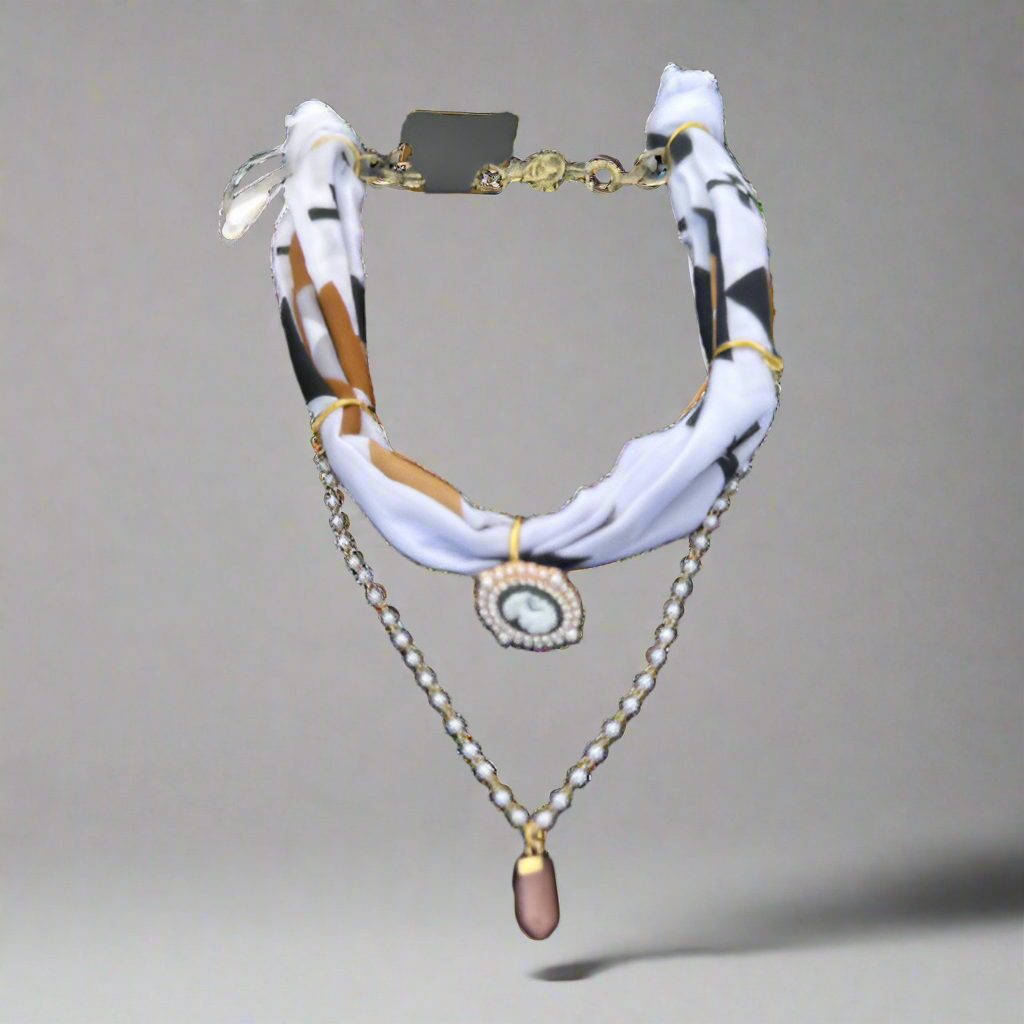 Scarf-Style Necklace with Central Charm and Stone Details – White Boho Print